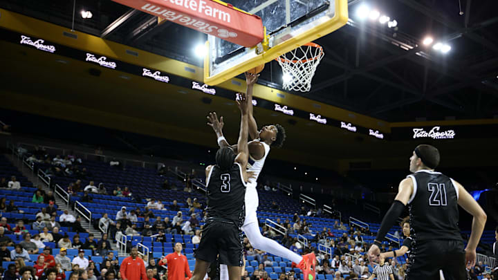 St. John Bosco's Christian Collins scores at the rim against Harvard-Westlake at UCLA's Pauley Pavilion on Nov. 22, 2025.