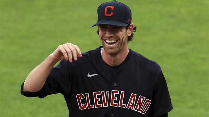 Cleveland Guardians pitcher Shane Bieber reacts during a baseball game against the Cincinnati Reds. Cleveland Guardians pitcher Shane Bieber reacts during a baseball game against the Cincinnati Reds.