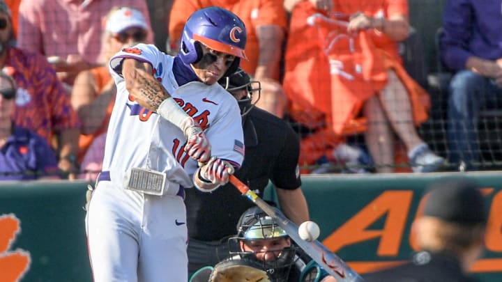 Jun 2, 2024; Clemson, South Carolina, USA; Clemson sophomore Cam Cannarella (10) hits against Coastal Carolina University during the bottom of the first inning of the NCAA baseball Clemson Regional at Doug Kingsmore Stadium in Clemson. Jun 2, 2024; Clemson, South Carolina, USA; Clemson sophomore Cam Cannarella (10) hits against Coastal Carolina University during the bottom of the first inning of the NCAA baseball Clemson Regional at Doug Kingsmore Stadium in Clemson.