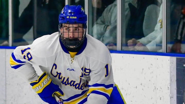 St. Cloud Cathedral hockey junior Elijah Van Heel skates with the puck during the Granite City Showcase against Sauk Rapids on Dec. 30, 2025 at the Municipal Athletic Complex. The Crusaders won 5-0.