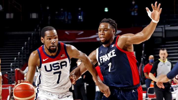 Aug 7, 2021; Saitama, Japan; United States forward Kevin Durant (7) drives to the basket against France power forward Guerschon Yabusele (7) in the men's basketball gold medal game during the Tokyo 2020 Olympic Summer Games at Saitama Super Arena. Mandatory Credit: Geoff Burke-Imagn Images Aug 7, 2021; Saitama, Japan; United States forward Kevin Durant (7) drives to the basket against France power forward Guerschon Yabusele (7) in the men's basketball gold medal game during the Tokyo 2020 Olympic Summer Games at Saitama Super Arena. Mandatory Credit: Geoff Burke-Imagn Images