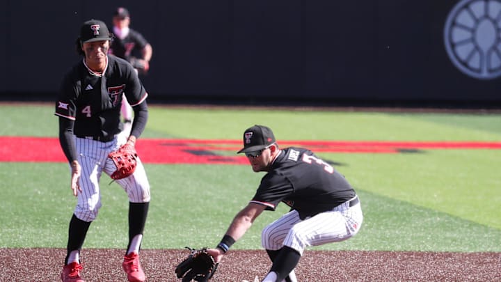 Texas Tech's Tracer Lopez attempts to collect a throw from the catcher on UAlbany's stolen base attempt during a non-conference baseball game, Friday, Feb. 20, 2026, at Rip Griffin Park. Texas Tech's Tracer Lopez attempts to collect a throw from the catcher on UAlbany's stolen base attempt during a non-conference baseball game, Friday, Feb. 20, 2026, at Rip Griffin Park.