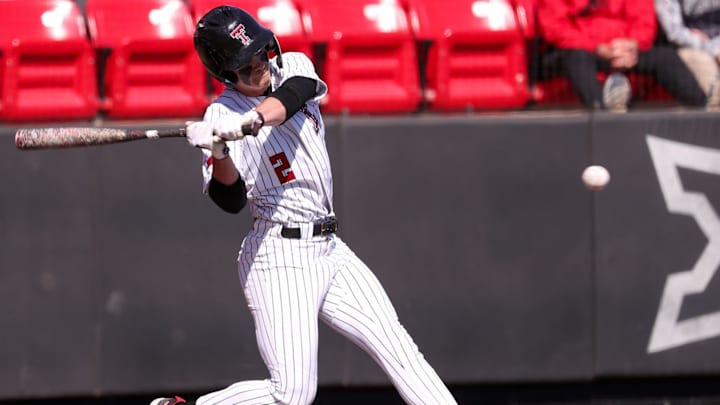 Texas Tech's Kyeler Thompson swings at a pitch against UAlbany during a non-conference baseball game, Sunday, Feb. 22, 2026, at Rip Griffin Park. Texas Tech's Kyeler Thompson swings at a pitch against UAlbany during a non-conference baseball game, Sunday, Feb. 22, 2026, at Rip Griffin Park.