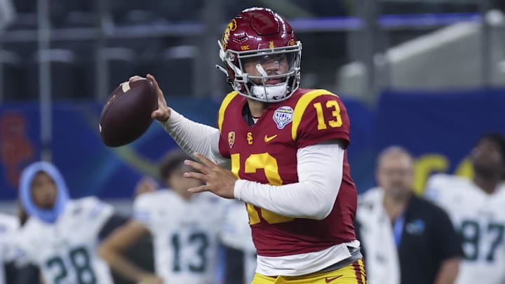Jan 2, 2023; Arlington, Texas, USA; USC Trojans quarterback Caleb Williams (13) throws during the