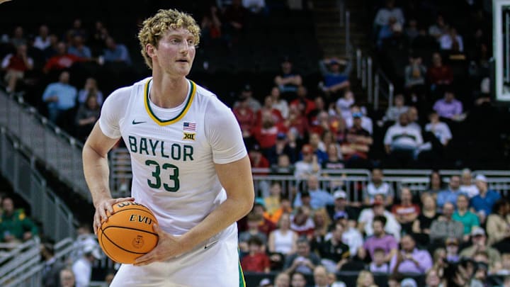 Mar 14, 2024; Kansas City, MO, USA; Baylor Bears forward Caleb Lohner (33) looks to pass during the