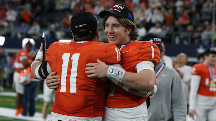 Celina's Luke Biagini (11), the defensive MVP, hugs Bowe Bentley, the offensive MVP, after the Class 4A, Division I State Championship game on Friday, Dec. 20, 2024, at AT&T Stadium in Arlington, Texas. Celina's Luke Biagini (11), the defensive MVP, hugs Bowe Bentley, the offensive MVP, after the Class 4A, Division I State Championship game on Friday, Dec. 20, 2024, at AT&T Stadium in Arlington, Texas.