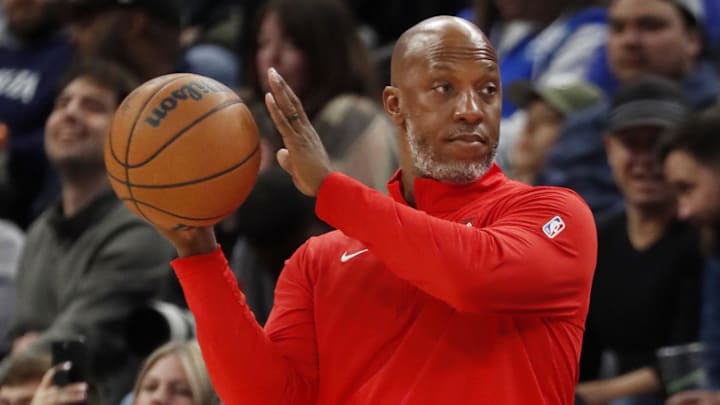 Nov 8, 2024; Minneapolis, Minnesota, USA; Portland Trail Blazers head coach Chauncey Billups returns a ball during the third quarter against the Minnesota Timberwolves at Target Center. Mandatory Credit: Bruce Kluckhohn-Imagn Images