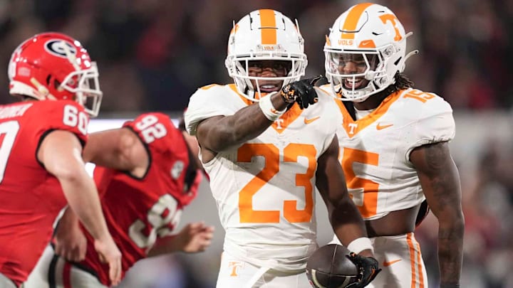 Tennessee defensive back Boo Carter (23) celebrates with Tennessee defensive back Edrees Farooq (15) after returning a punt during a college football game between Tennessee and Georgia at Sanford Stadium in Athens, Ga., on Saturday, November 16, 2024. Tennessee defensive back Boo Carter (23) celebrates with Tennessee defensive back Edrees Farooq (15) after returning a punt during a college football game between Tennessee and Georgia at Sanford Stadium in Athens, Ga., on Saturday, November 16, 2024.