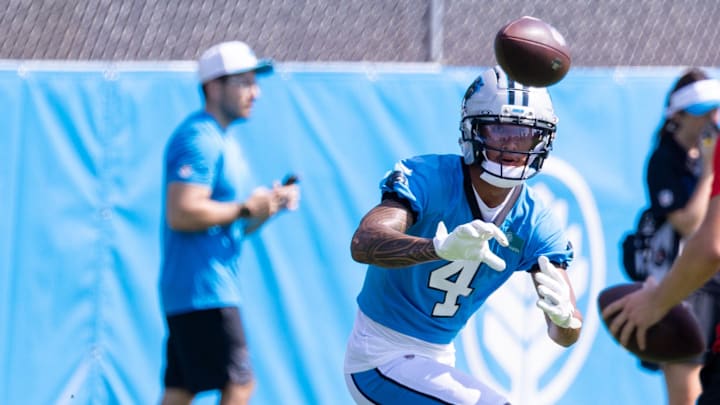 Jul 24, 2025; Charlotte, NC, USA; Carolina Panthers wide receiver Tetairoa McMillan (4) catches a pass during training camp. Mandatory Credit: Scott Kinser-Imagn Images