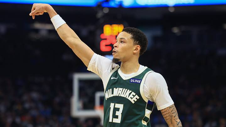 Oct 23, 2026; Milwaukee, WI, USA;  Milwaukee Bucks guard Ryan Rollins (13) holds his finish after shooting the ball in the second quarter against the Chicago Bulls at Fiserv Forum.  Mandatory Credit: Brad Repplinger-Imagn Images