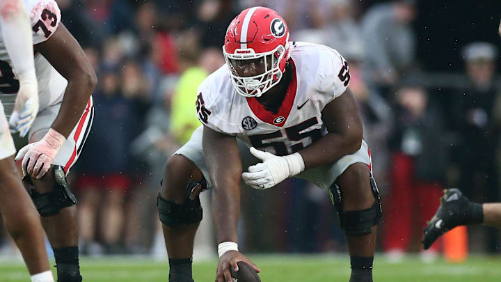 Nov 9, 2024; Oxford, Mississippi, USA; Georgia Bulldogs offensive lineman Jared Wilson (55) prepares to snap the ball during the first half against the Mississippi Rebels at Vaught-Hemingway Stadium. Mandatory Credit: Petre Thomas-Imagn Images