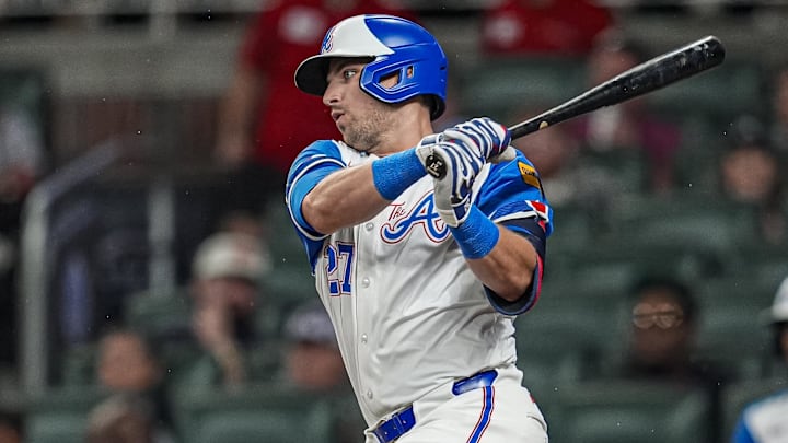 Atlanta Braves third baseman Austin Riley (27) singles against the Philadelphia Phillies 