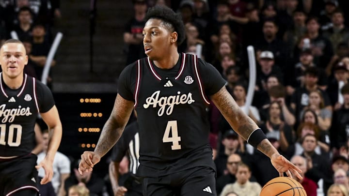 Feb 22, 2025; College Station, Texas, USA; Texas A&M Aggies guard Wade Taylor IV (4) brings the ball down court during the first half against the Tennessee Volunteers at Reed Arena. Mandatory Credit: Maria Lysaker-Imagn Images  