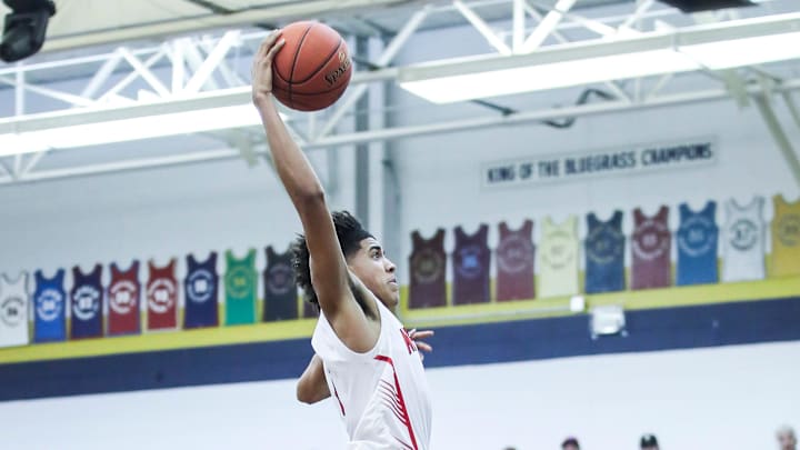Newport's Taylen Kinney (0) goes up for two of his 13 points in the first half against Washington County at Wednesday's 2023 King of the Bluegrass basketball tournament at Fairdale High School. Dec. 20, 2023 Newport's Taylen Kinney (0) goes up for two of his 13 points in the first half against Washington County at Wednesday's 2023 King of the Bluegrass basketball tournament at Fairdale High School. Dec. 20, 2023