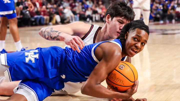 Feb 24, 2026; Columbia, South Carolina, USA; Kentucky Wildcats guard Jasper Johnson (2) steals the ball from South Carolina Gamecocks guard Mike Sharavjamts (55) during the first half at Colonial Life Arena. Mandatory Credit: Jeff Blake-Imagn Images