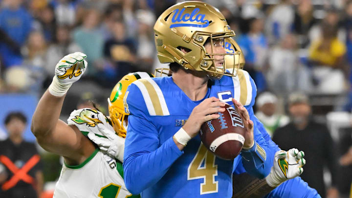 Sep 28, 2024; Pasadena, California, USA; (Editors Notes: Caption Correction) Oregon Ducks linebacker Matayo Uiagalelei (10) moves in to sack UCLA Bruins quarterback Ethan Garbers (4) during the second quarter at Rose Bowl. Mandatory Credit: Robert Hanashiro-Imagn Images Sep 28, 2024; Pasadena, California, USA; (Editors Notes: Caption Correction) Oregon Ducks linebacker Matayo Uiagalelei (10) moves in to sack UCLA Bruins quarterback Ethan Garbers (4) during the second quarter at Rose Bowl. Mandatory Credit: Robert Hanashiro-Imagn Images