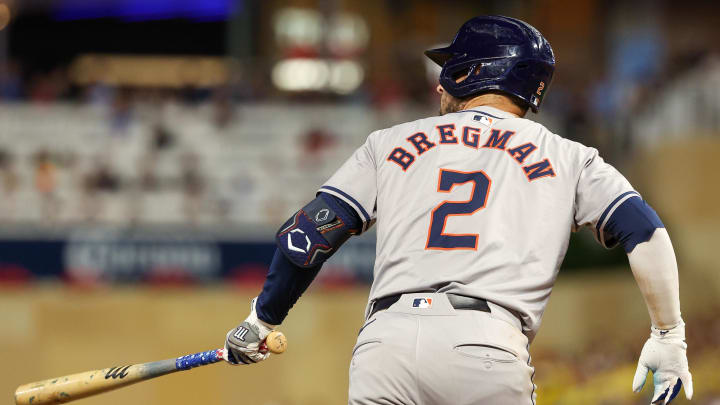 Jul 5, 2024; Minneapolis, Minnesota, USA; Houston Astros third baseman Alex Bregman (2) hits a three-run home run against the Minnesota Twins during the ninth inning at Target Field. Mandatory Credit: Matt Krohn-USA TODAY Sports