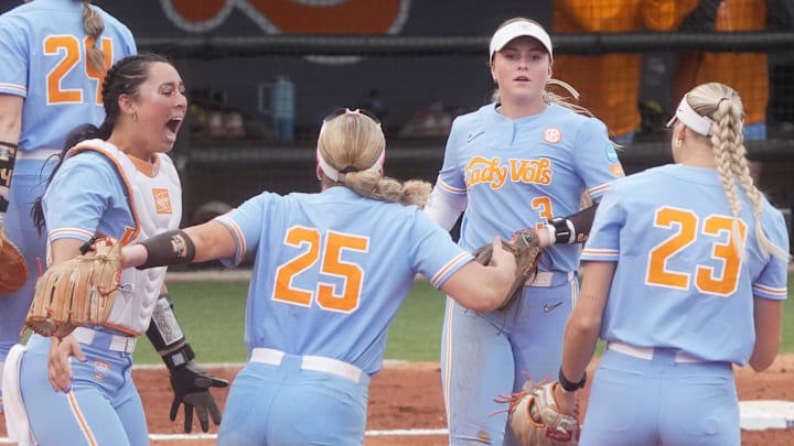 From left Tennessee catcher Sophia Nugent (7), Tennessee utility player Ella Dodge (25), Tennessee outfielder Taylor Pannell (3), and Tennessee pitcher Karlyn Pickens (23) celebrate after winning an NCAA super regional game between Tennessee and Nebraska at Sherri Parker Lee Stadium in Knoxville, Tenn., on May 24, 2025. Tennessee defeated Nebraska.
