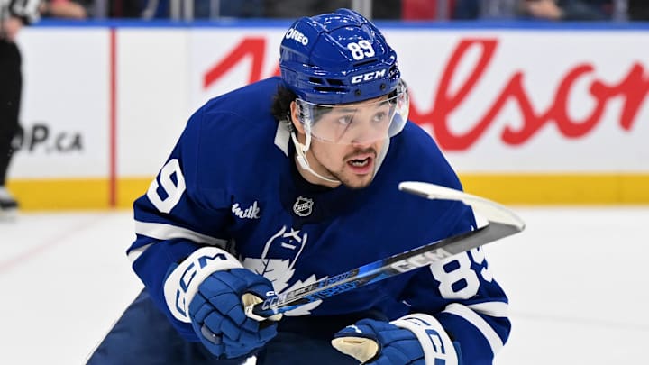 Jan 16, 2025; Toronto, Ontario, CAN;  Toronto Maple Leafs forward Nick Robertson (89) pursues the play against the New Jersey Devils in the third period at Scotiabank Arena. Mandatory Credit: Dan Hamilton-Imagn Images