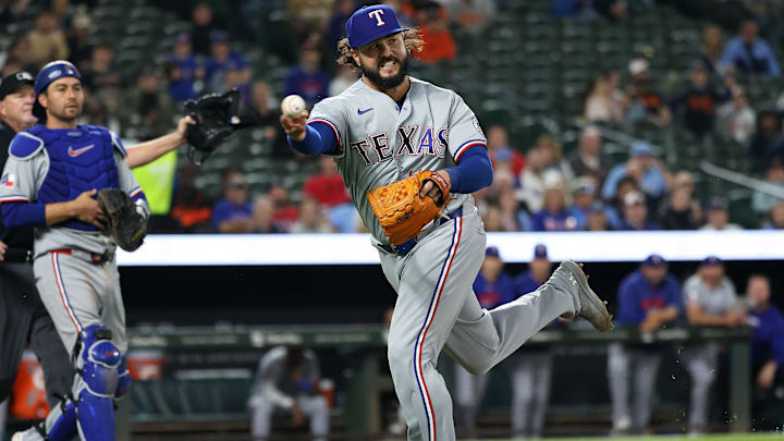 Mar 30, 2026: Texas Rangers pitcher Jakob Junis (16) throws to first base for an out during the seventh inning against the Baltimore Orioles at Oriole Park at Camden Yards. 