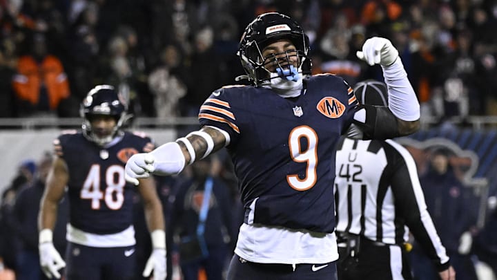 Jan 10, 2026; Chicago, IL, USA;  Chicago Bears safety Jaquan Brisker (9) fires up the crowd after a penalty call against the Green Bay Packers during the second half of an NFC Wild Card Round game at Soldier Field. Mandatory Credit: Matt Marton-Imagn Images