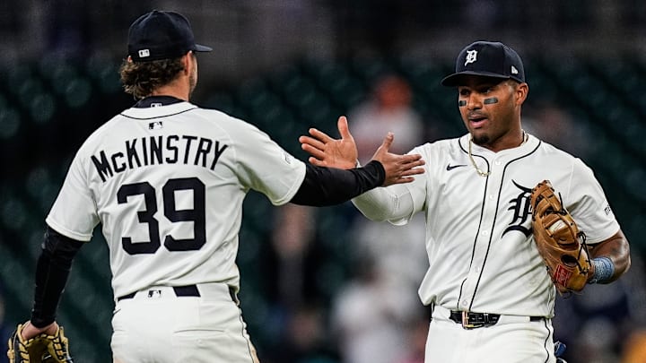 Detroit Tigers second base Andy Ibáñez (77), right, and third base Zach McKinstry (39) celebrate 6-1 win over Kansas City Royals at Comerica Park in Detroit on Thursday, April 17, 2025.