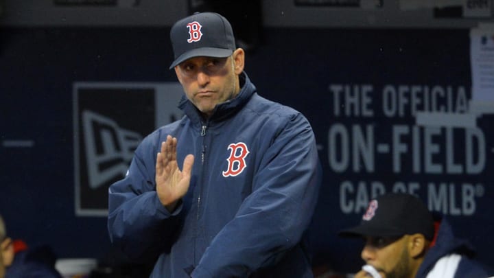 Apr 6, 2016; Cleveland, OH, USA; Boston Red Sox bench coach Torey Lovullo (17) signals from the dugout in the first inning against the Cleveland Indians at Progressive Field. Mandatory Credit: David Richard-Imagn Images
