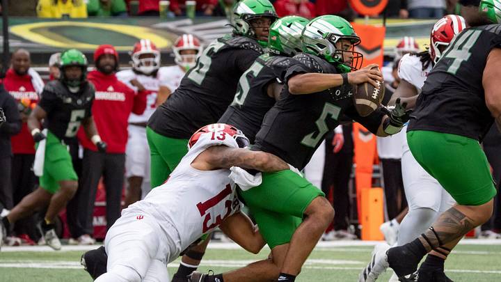 Indiana defensive lineman Kellan Wyatt sacks Oregon quarterback Dante Moore as the Oregon Ducks host the Indiana Hoosiers Oct. 11, 2025, at Autzen Stadium in Eugene, Oregon.