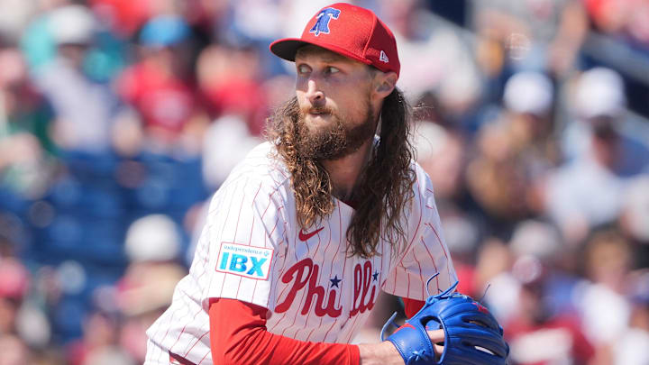 Feb 27, 2025; Clearwater, Florida, USA; Philadelphia Phillies pitcher Matt Strahm (25) throws a pitch against the New York Yankees during the third inning at BayCare Ballpark.
