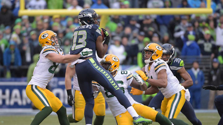 Seattle Seahawks receiver Chris Matthews (13) recovers an onside kick ahead of Green Bay Packers receiver Jordy Nelson. Seattle Seahawks receiver Chris Matthews (13) recovers an onside kick ahead of Green Bay Packers receiver Jordy Nelson.