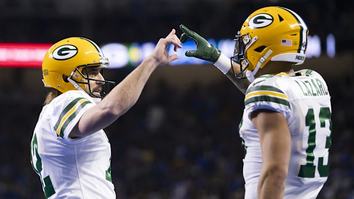 Jan 9, 2022; Detroit, Michigan, USA; Green Bay Packers wide receiver Allen Lazard (13) and quarterback Aaron Rodgers (12) celebrate together after connecting for a touchdown during the second quarter against the Detroit Lions at Ford Field. Mandatory Credit: Raj Mehta-Imagn Images Jan 9, 2022; Detroit, Michigan, USA; Green Bay Packers wide receiver Allen Lazard (13) and quarterback Aaron Rodgers (12) celebrate together after connecting for a touchdown during the second quarter against the Detroit Lions at Ford Field. Mandatory Credit: Raj Mehta-Imagn Images