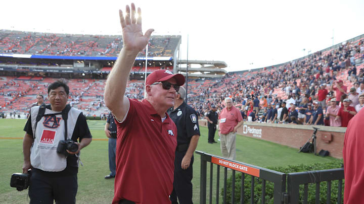 Sep 21, 2024; Auburn, Alabama, USA;  Arkansas Razorbacks offensive coordinator Bobby Petrino waves to fans after the Razorbacks beat the Auburn Tigers at Jordan-Hare Stadium. Mandatory Credit: John Reed-Imagn Images