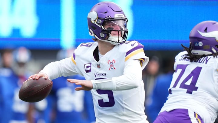 Dec 21, 2025; East Rutherford, New Jersey, USA; Minnesota Vikings quarterback J.J. McCarthy (9) drops back to pass against the New York Giants during the first half at MetLife Stadium. Mandatory Credit: Robert Deutsch-Imagn Images