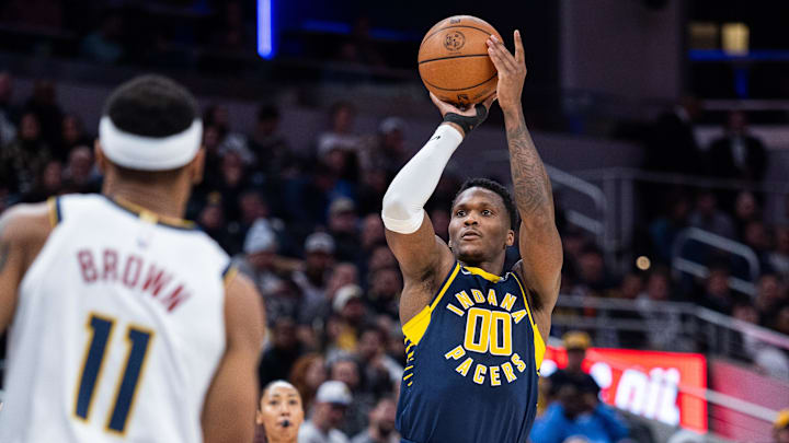 Dec 3, 2025; Indianapolis, Indiana, USA; Indiana Pacers guard Bennedict Mathurin (00) shoots the ball in the second half against the Denver Nuggets at Gainbridge Fieldhouse. Mandatory Credit: Trevor Ruszkowski-Imagn Images