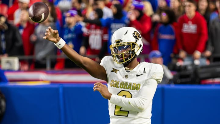 Nov 23, 2024; Kansas City, Missouri, USA;  Colorado quarterback Shedeur Sanders (2) warms up during the 4th quarter between the Kansas Jayhawks and the Colorado Buffaloes at GEHA Field at Arrowhead Stadium. Mandatory Credit: Nick Tre. Smith-Imagn Images