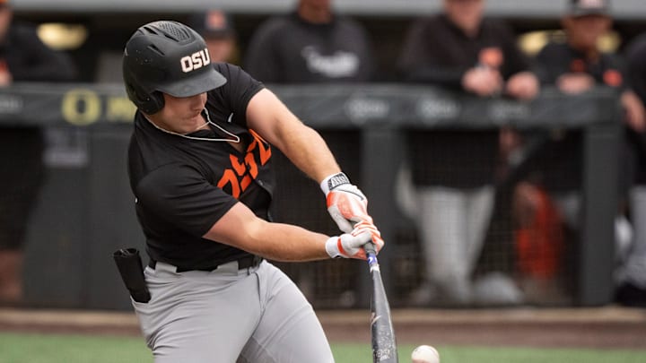 Oregon State catcher Wilson Weber hits a single as the Oregon Ducks host the Oregon State Beavers on April 25, 2025, at PK Park in Eugene.