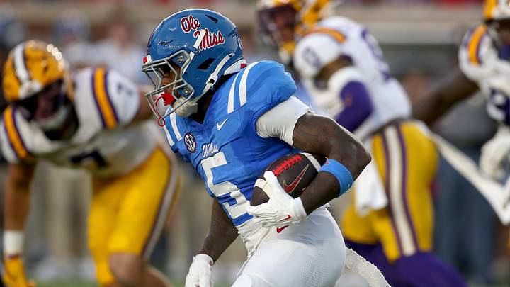 Ole Miss Rebels running back Kewan Lacy (5) runs the ball during the first quarter against the LSU Tigers at Vaught-Hemingway Stadium. Ole Miss Rebels running back Kewan Lacy (5) runs the ball during the first quarter against the LSU Tigers at Vaught-Hemingway Stadium.