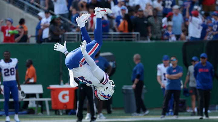 Sep 14, 2025; East Rutherford, New Jersey, USA; Buffalo Bills wide receiver Elijah Moore (18) reacts by doing a flip against the New York Jets during the second half at MetLife Stadium. Mandatory Credit: Vincent Carchietta-Imagn Images