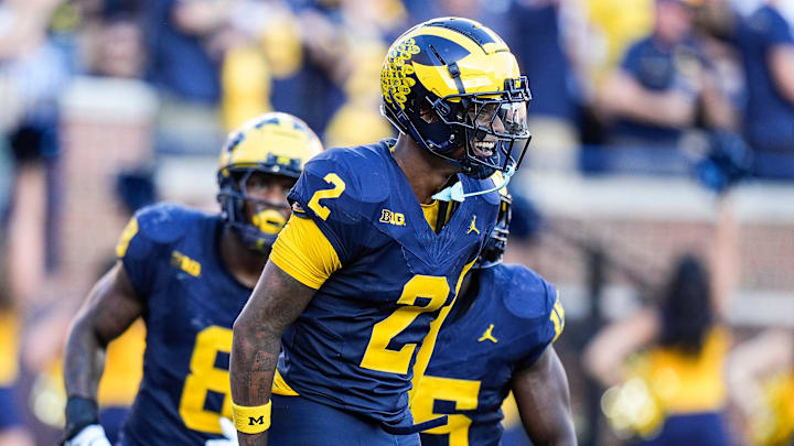 Michigan defensive back Will Johnson (2) celebrates a touchdown after intercepting USC quarterback Miller Moss (7) during the second half at Michigan Stadium in Ann Arbor on Saturday, Sept. 21, 2024. Michigan defensive back Will Johnson (2) celebrates a touchdown after intercepting USC quarterback Miller Moss (7) during the second half at Michigan Stadium in Ann Arbor on Saturday, Sept. 21, 2024.