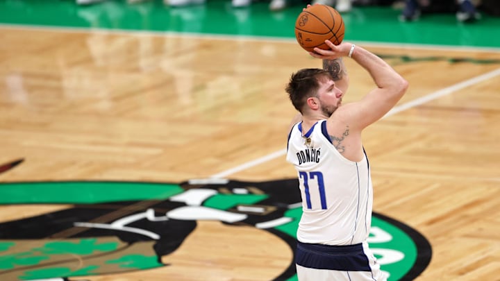 Jun 17, 2024; Boston, Massachusetts, USA; Dallas Mavericks guard Luka Doncic (77) shoots the ball against the Boston Celtics during the third quarter in game five of the 2024 NBA Finals at TD Garden.