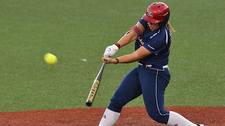 Amanda Lorenz, 2025 AUSL All-Star Cup outfielder and Series 1 Gold team captain, sends the ball out of the yard while playing for the USSSA Pride during a independent professional softball game against the Aussie Peppers in Viera, Fla. at Space Ghost Stadium circa 2020.