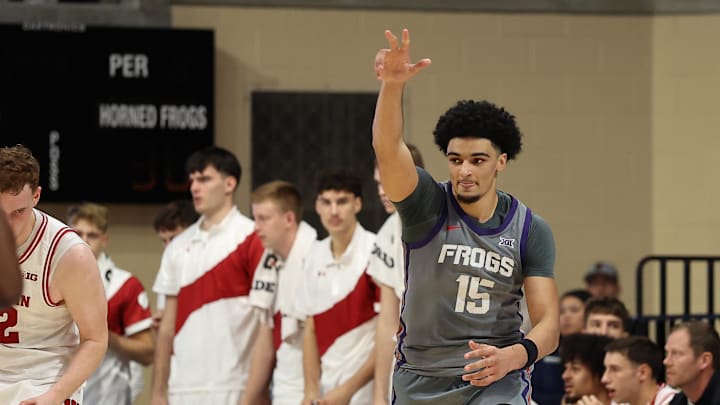 Nov 28, 2025; San Diego, CA, USA; Texas Christian University Horned Frogs forward Micah Robinson (5) reacts against scoring against Wisconsin Badgers during the first half at Jenny Craig Pavilion. 