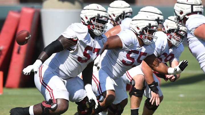 The Crimson Tide players and coaches continue working toward the season opener in practice Tuesday, Aug. 13, 2024. Alabama offensive lineman Elijah Pritchett (57), Alabama offensive lineman Roq Montgomery (55) and Alabama offensive lineman Joseph Ionata (69) move to block. The Crimson Tide players and coaches continue working toward the season opener in practice Tuesday, Aug. 13, 2024. Alabama offensive lineman Elijah Pritchett (57), Alabama offensive lineman Roq Montgomery (55) and Alabama offensive lineman Joseph Ionata (69) move to block.