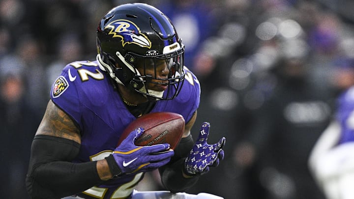 Jan 4, 2025; Baltimore, Maryland, USA;  Baltimore Ravens running back Derrick Henry (22) runs with the ball during the first quarter against the Cleveland Browns at M&T Bank Stadium. Mandatory Credit: Tommy Gilligan-Imagn Images