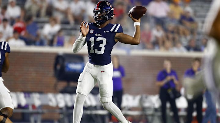 Aug 31, 2024; Oxford, Mississippi, USA; Mississippi Rebels quarterback Austin Simmons (13) passes the ball during the second half  against the Furman Paladins at Vaught-Hemingway Stadium. Mandatory Credit: Petre Thomas-Imagn Images