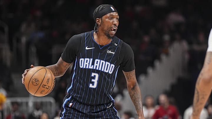 Apr 13, 2025; Atlanta, Georgia, USA: Orlando Magic guard Kentavious Caldwell-Pope (3) controls the ball against the Atlanta Hawks during the first half at State Farm Arena. Mandatory Credit: Dale Zanine-Imagn Images