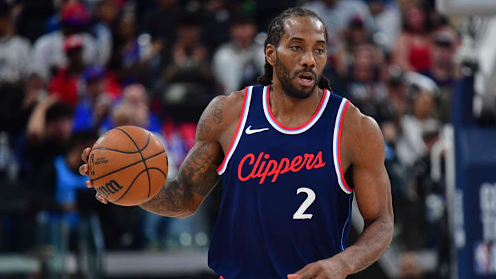 Apr 24, 2025; Inglewood, California, USA; Los Angeles Clippers forward Kawhi Leonard (2) moves the ball up court against the Denver Nuggets during the second half of game three in the first round for the 2024 NBA Playoffs at Intuit Dome. Mandatory Credit: Gary A. Vasquez-Imagn Images