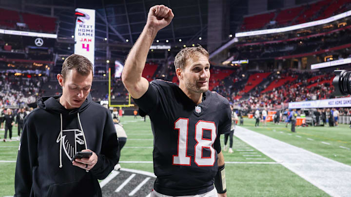 Dec 29, 2025; Atlanta, Georgia, USA; Atlanta Falcons quarterback Kirk Cousins (18) celebrates after a victory over the Los Angeles Rams at Mercedes-Benz Stadium. Mandatory Credit: Brett Davis-Imagn Images
