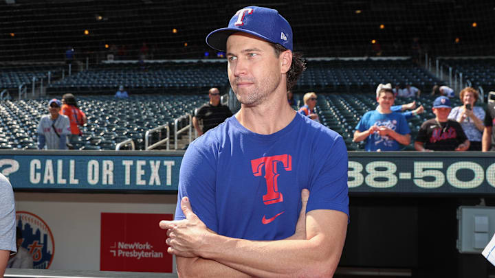 Texas Rangers pitcher Jacob deGrom looks on during a game at Citi Field. Texas Rangers pitcher Jacob deGrom looks on during a game at Citi Field.