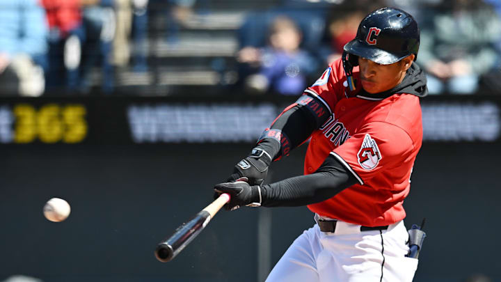 Apr 8, 2026; Cleveland, Ohio, USA; Cleveland Guardians second baseman Juan Brito (34) hits an RBI double during the fifth inning against the Kansas City Royals at Progressive Field. Mandatory Credit: Ken Blaze-Imagn Images